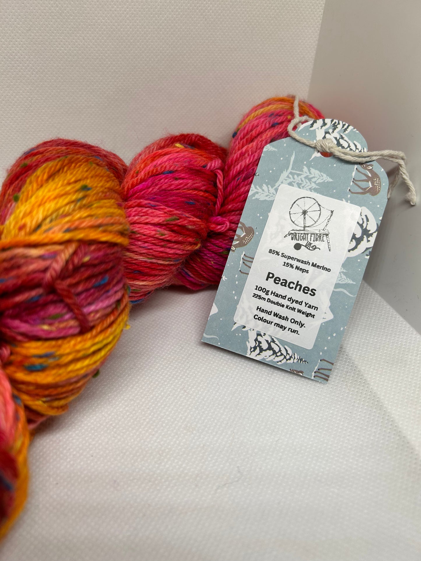 Peaches Hand dyed Yarn with coloured Neps