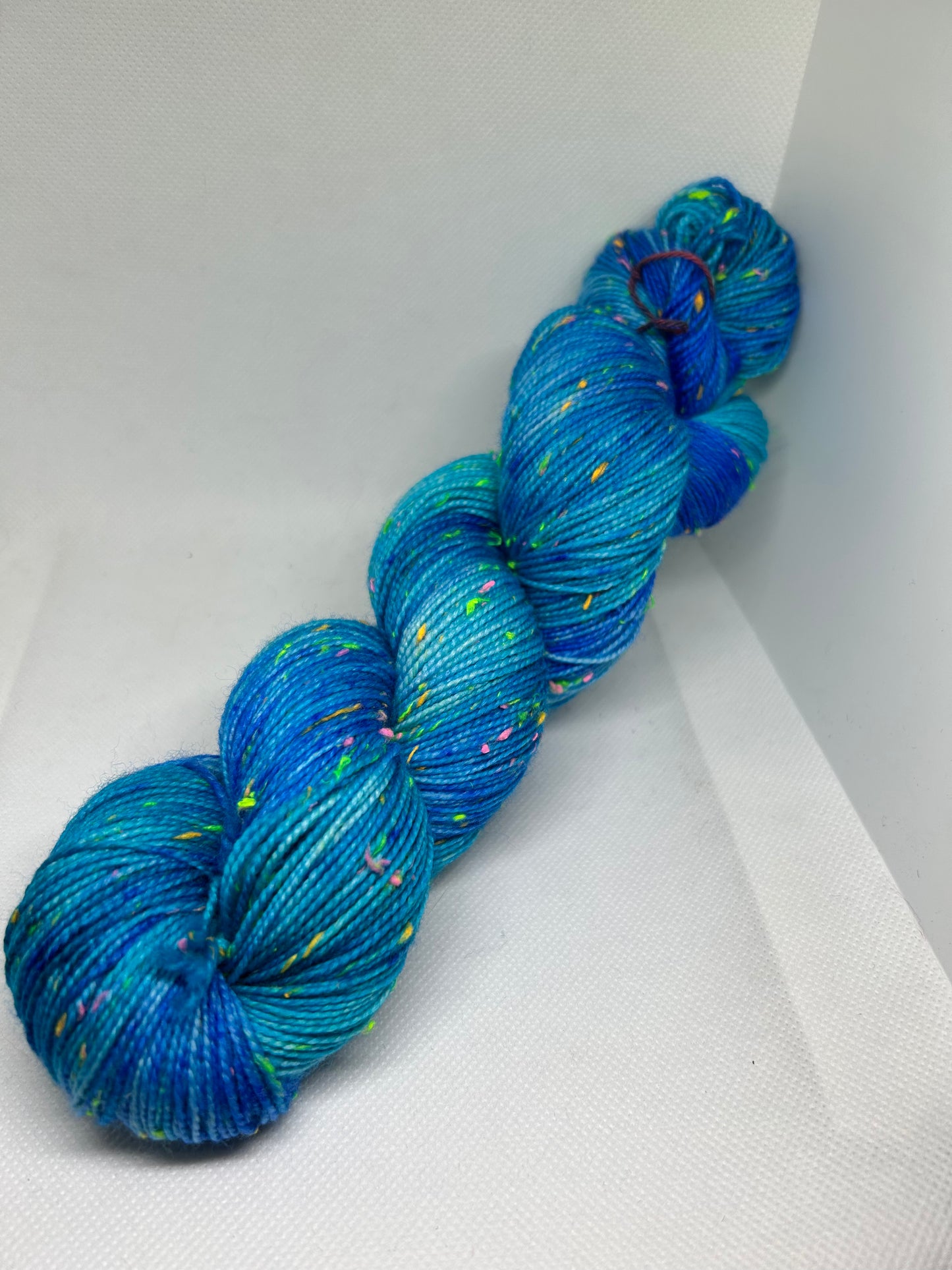 Ocean Blue Hand dyed Yarn with Neon Neps